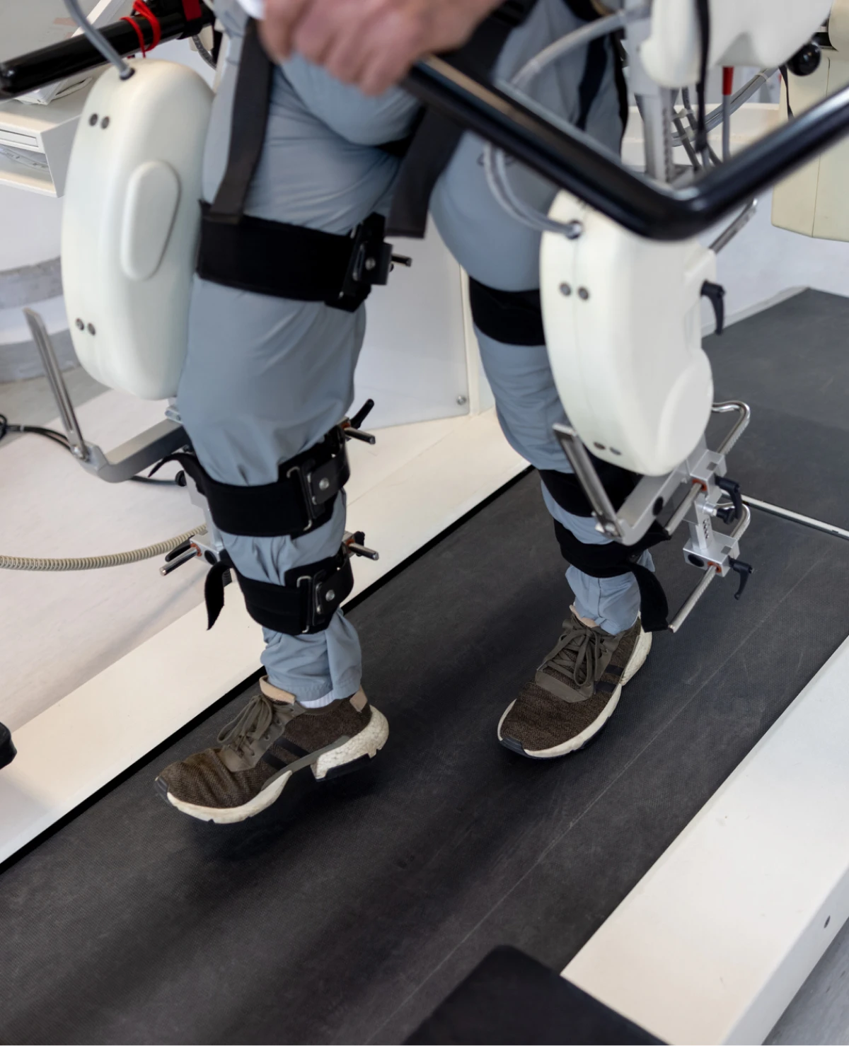 Walking on treadmill with robotic aid